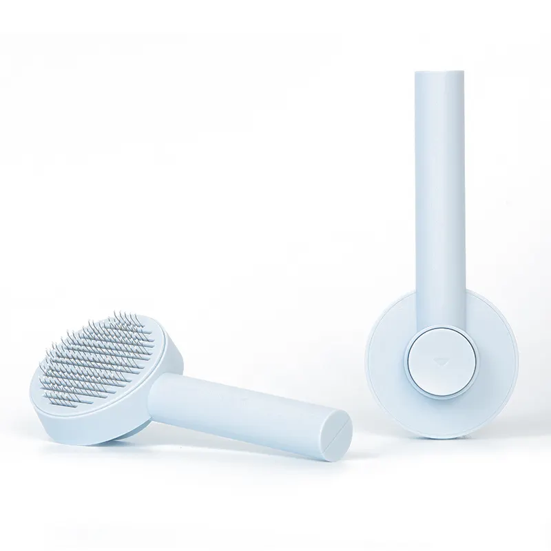Brosse de toilettage auto-nettoyante, coloris bleu